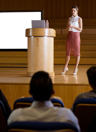 nebb-seminars-woman-speaking-to-crowd