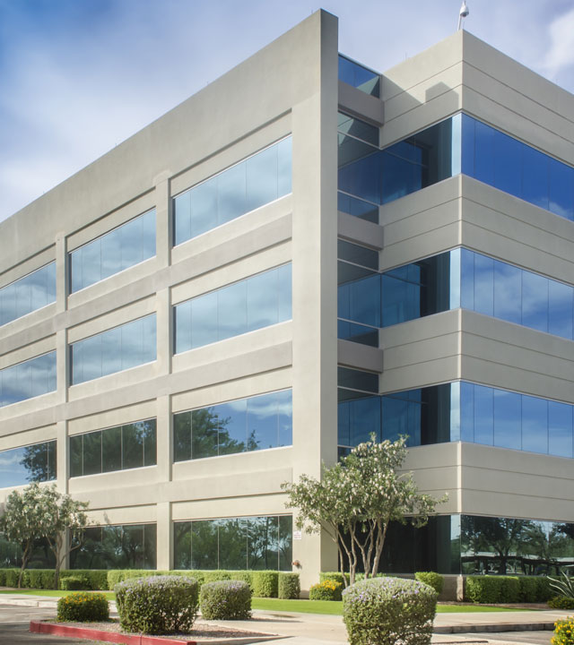 front-of-beige-building-with-bushes-in-front-nebb-study-materials