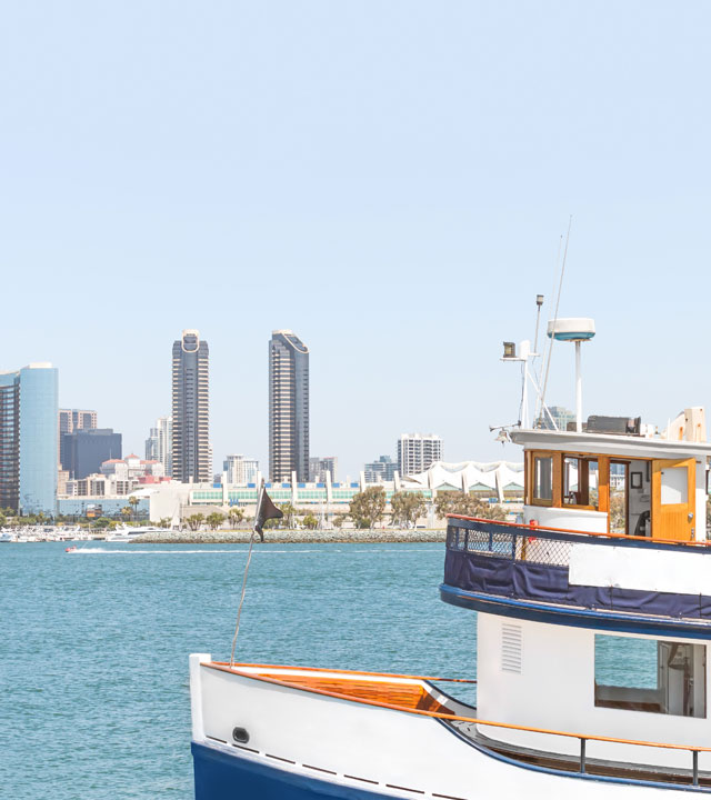 boat-in-water-next-to-city-skyline-cleanroom-performance-testing